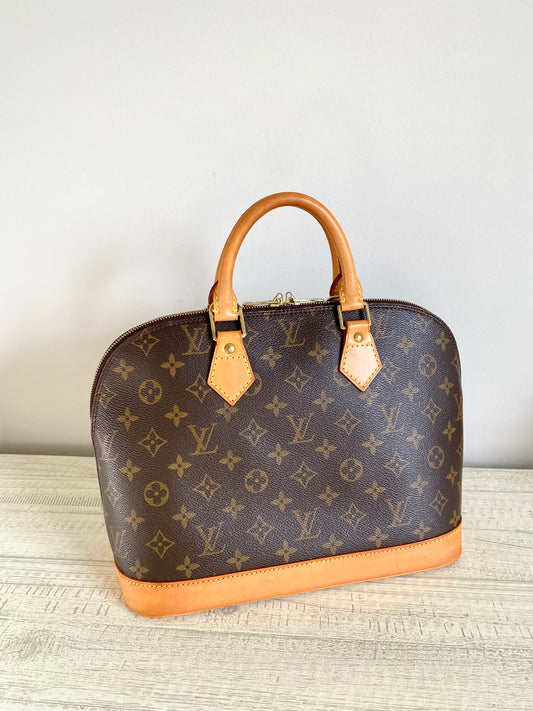 Louis Vuitton Alma Handbag