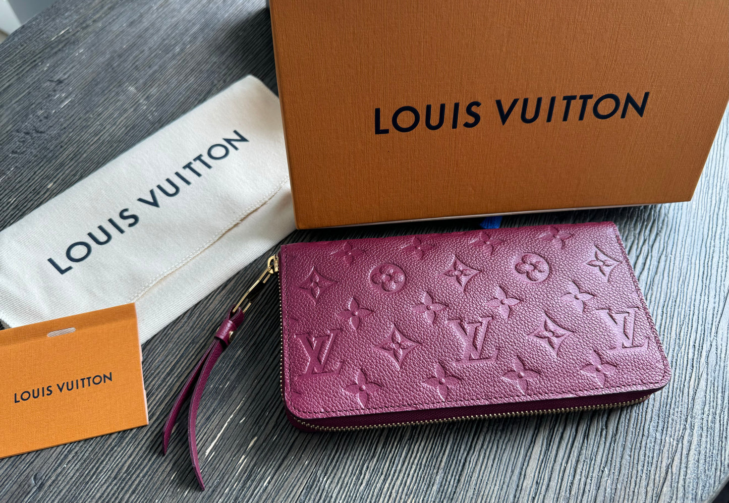 Louis Vuitton Monogram Empreinte Secret Ron Leather Zip Around Wallet