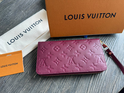 Louis Vuitton Monogram Empreinte Secret Ron Leather Zip Around Wallet