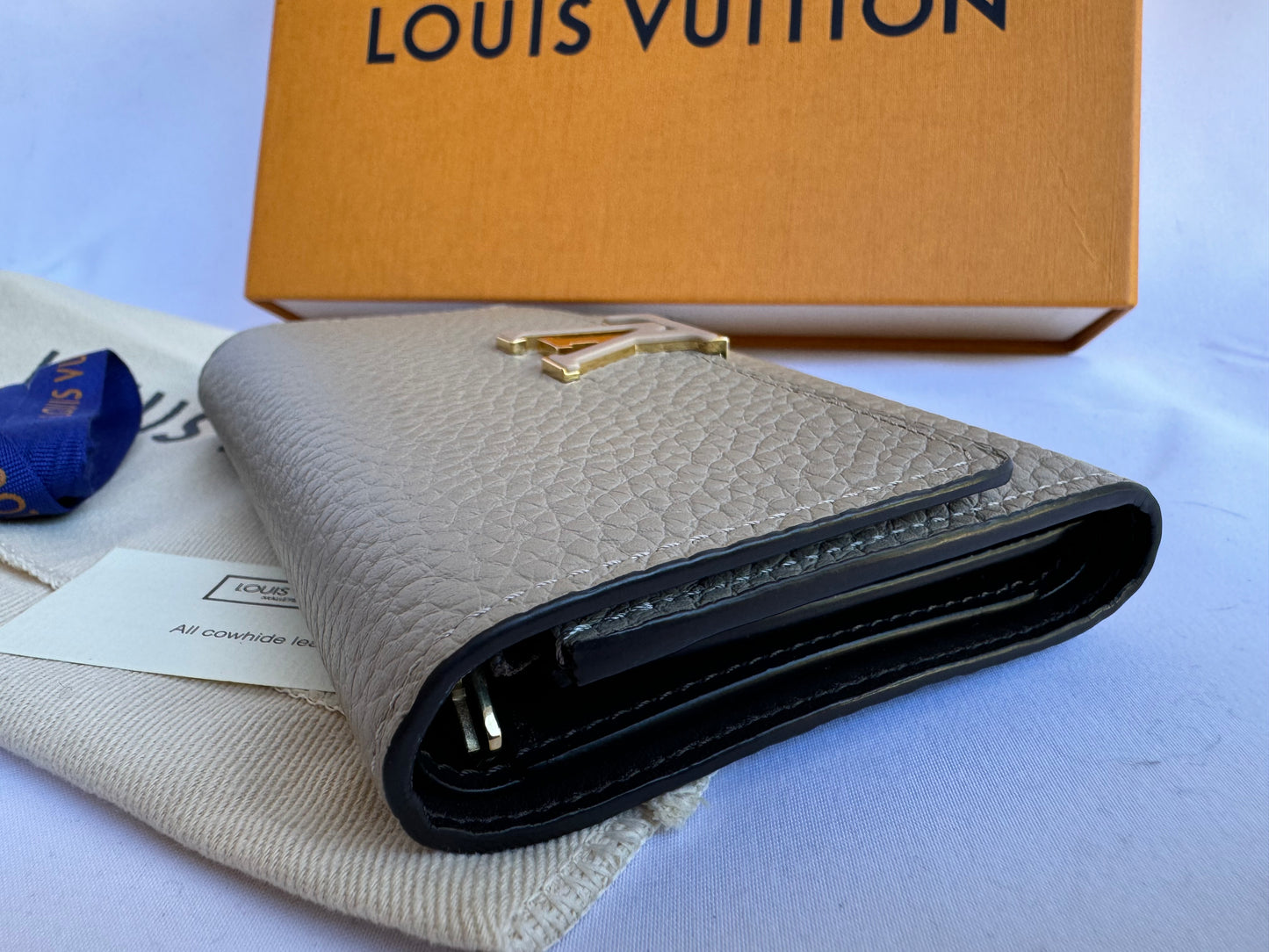 Louis Vuitton Capucines Compact Galet Trifold Wallet M62159 MRP $1030