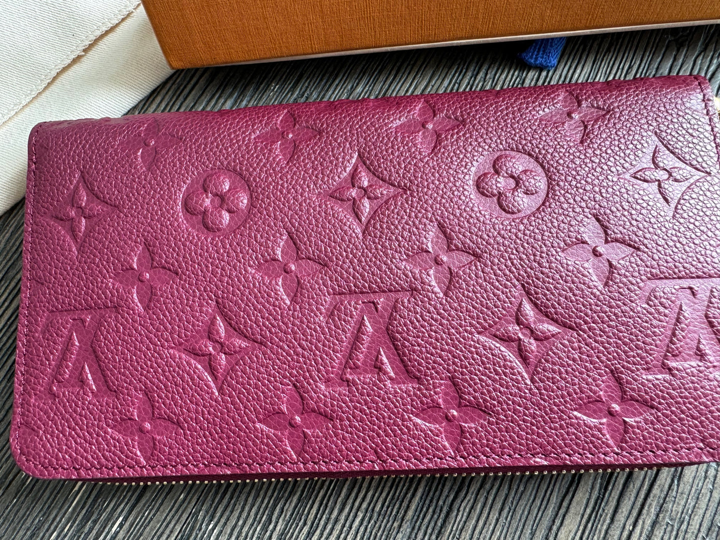 Louis Vuitton Monogram Empreinte Secret Ron Leather Zip Around Wallet