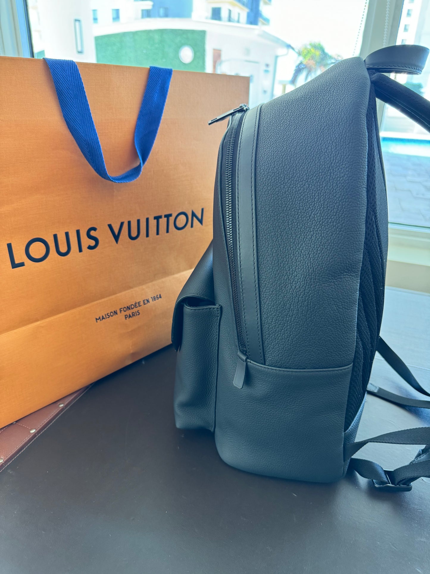 Louis Vuitton Takeoff Backpack Grained Calfskin Aerogram